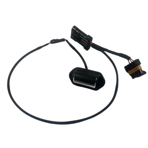 Automotive wiring harness with license plate light assembly.