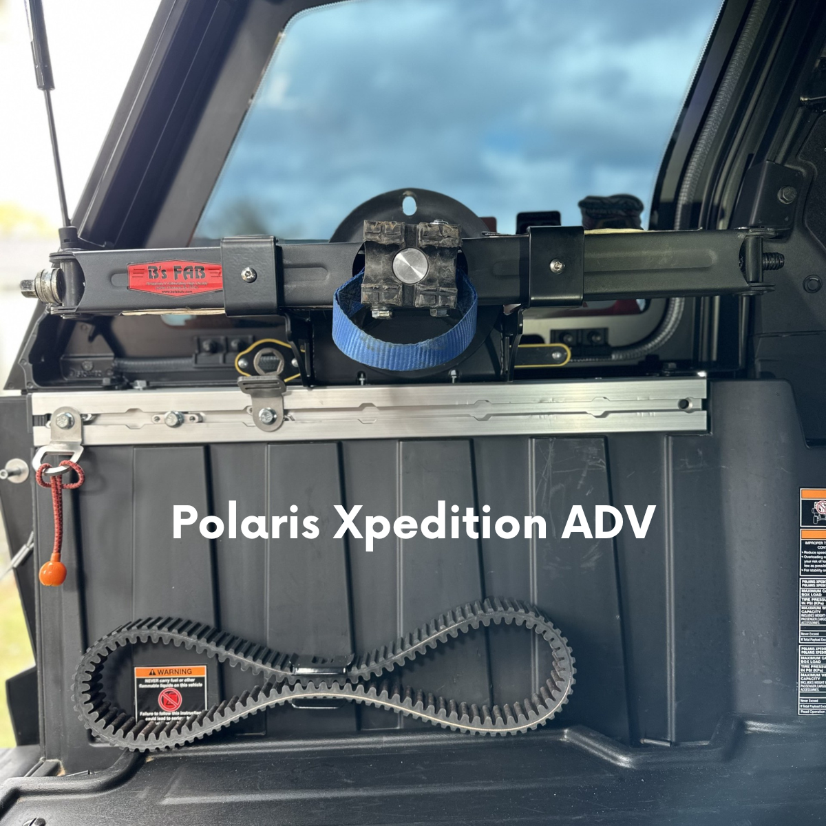 Interior storage of a Polaris Xpedition ADV with spare belt.